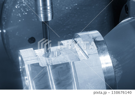 High-precision hole boring process on aluminum parts using a sophisticated 5-axis CNC milling machine. 138676140