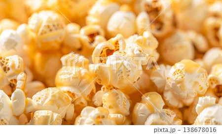 Popcorn shines brightly under studio lights, focusing attention on its texture and color during a filming session in a production space Popcorn shines brightly under studio lights, focusing attention on its texture and color during a filming session in a production space 138678016
