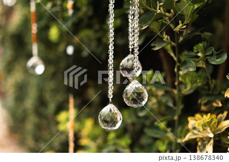 Crystal ornaments hanging at market stall during festival in Berlin 138678340