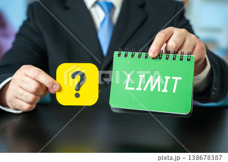 Limit and question mark. symbolizing restrictions, boundaries, uncertainty, decision-making, and limits in finance, business, or personal life. 138678387