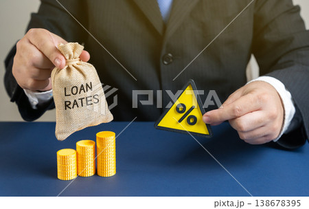 Loan rates concept. Interest percentages charged by banks or lenders on borrowed money. They indicate borrowing costs, financial planning, credit, economic conditions for individuals and businesses Loan rates concept. Interest percentages charged by banks or lenders on borrowed money. They indicate borrowing costs, financial planning, credit, economic conditions for individuals and businesses 138678395