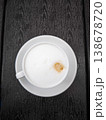 Creamy coffee cup Cappuccino with frothy milk on dark wooden table perfect for coffee lovers concept. copy space 138678720