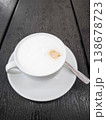 Creamy coffee cup Cappuccino with frothy milk on a saucer showcasing a delightful beverage concept. copy space 138678723