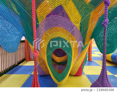 A colorful knitted play maze in the children's room of a supermarket 138680166