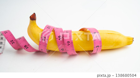 Banana with measuring tape, penis health. 138680504