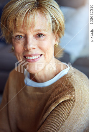 Portrait, mature or happy woman in apartment to relax with freedom on living room sofa or couch. Home, face or senior lady with smile, peace or wellness in retirement or house for a resting break Portrait, mature or happy woman in apartment to relax with freedom on living room sofa or couch. Home, face or senior lady with smile, peace or wellness in retirement or house for a resting break 138682510