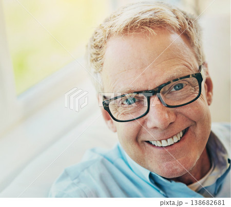 Portrait, glasses or happy mature man in house living room to relax with care on sofa for resting break. Apartment, face or senior male person with smile or wellness in retirement, lounge or home Portrait, glasses or happy mature man in house living room to relax with care on sofa for resting break. Apartment, face or senior male person with smile or wellness in retirement, lounge or home 138682681