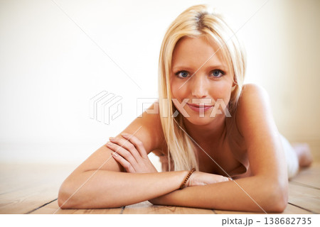 Portrait, relax and happy woman on floor in home in living room to relax. Face, natural beauty or confident blonde girl in house, lounge or apartment with healthy skin, mockup or space in Switzerland Portrait, relax and happy woman on floor in home in living room to relax. Face, natural beauty or confident blonde girl in house, lounge or apartment with healthy skin, mockup or space in Switzerland 138682735