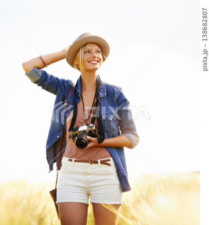 Field, photographer and woman with a camera, summer and thinking with nature, picture and memory. Person, vacation and girl with photography, tourism and journey with sunshine, holiday and travel Field, photographer and woman with a camera, summer and thinking with nature, picture and memory. Person, vacation and girl with photography, tourism and journey with sunshine, holiday and travel 138682807