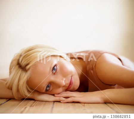 Portrait, beauty and happy woman on floor in home in living room to relax. Natural face, person and blonde girl in house, lounge and apartment with healthy skin, mockup and space in Switzerland Portrait, beauty and happy woman on floor in home in living room to relax. Natural face, person and blonde girl in house, lounge and apartment with healthy skin, mockup and space in Switzerland 138682851