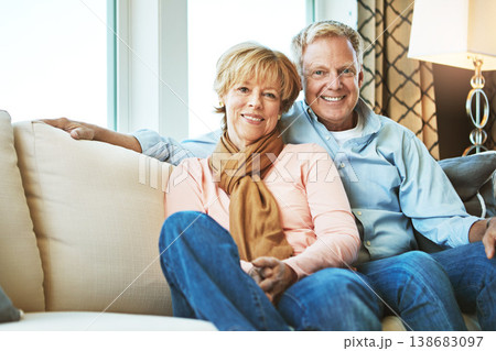 Retirement, love and portrait of old couple on sofa for bonding, healthy relationship and marriage. Happy, home and senior man and woman on couch for embrace, commitment and happiness in living room 138683097