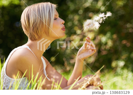 Dandelion, outdoor or woman with nature, wish or summer with hope, forest or vacation. Person, park and girl with magic in a garden, dream or holiday with travelling, adventure or spring with fantasy 138683129