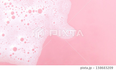 White soap foam bubbles on pink background, skincare cleansing and hygiene concept White soap foam bubbles on pink background, skincare cleansing and hygiene concept 138683209