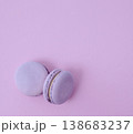 Pair of lavender French macarons on solid lilac background, purple monochrome dessert photography for cafe menu 138683237