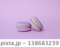 Pair of lavender French macarons on solid lilac background, purple monochrome dessert photography for cafe menu 138683239
