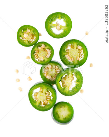 Fresh jalapeno pepper isolated on white background. Slices of green hot serrano pepper. Clipping path. Top view. 138683262