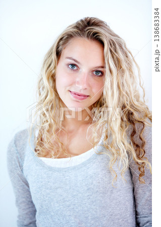 Portrait, woman and natural beauty with wellness and self care, glow or casual fashion in studio. Cosmetic, person and face with smile for glowing skin and facial treatment on white background Portrait, woman and natural beauty with wellness and self care, glow or casual fashion in studio. Cosmetic, person and face with smile for glowing skin and facial treatment on white background 138683384