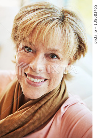 Portrait, happy or senior woman in living room to relax with freedom on couch or sofa at home. Apartment, face or mature person with smile or wellness in retirement, lounge or house for resting break Portrait, happy or senior woman in living room to relax with freedom on couch or sofa at home. Apartment, face or mature person with smile or wellness in retirement, lounge or house for resting break 138683455