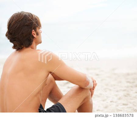 Man, thinking and sitting on beach sand relax for ocean summer air, vacation peace or sunshine travel. Male person, back view and thoughts or calm sea rest or water waves, outdoor or tropical island Man, thinking and sitting on beach sand relax for ocean summer air, vacation peace or sunshine travel. Male person, back view and thoughts or calm sea rest or water waves, outdoor or tropical island 138683578