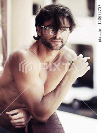 Portrait, man or artist with paintbrush while thinking for inspiration, vision or idea for work on balcony. Young person, glasses and topless to relax in Paris by travel for trip, show or exhibition Portrait, man or artist with paintbrush while thinking for inspiration, vision or idea for work on balcony. Young person, glasses and topless to relax in Paris by travel for trip, show or exhibition 138683757