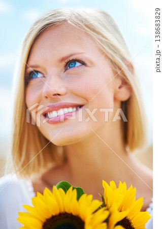 Woman, face and thinking with flowers for summer break, eco friendly or vacation in nature. Closeup of happy female person smile in happiness with sunflower, outdoor or petal for season change Woman, face and thinking with flowers for summer break, eco friendly or vacation in nature. Closeup of happy female person smile in happiness with sunflower, outdoor or petal for season change 138683829