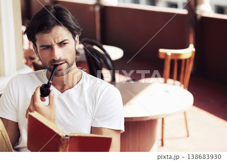 Young, man and smoke while thinking in cafe in Paris with book on vacation, holiday or trip. Person, tobacco pipe and travel to relax for wellness with vision, idea and dream of startup business 138683930