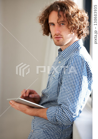 Tablet, portrait and business man typing, scroll or surfing internet for website research, online company data or review. Web analytics, entrepreneur and professional person search agency database 138683935