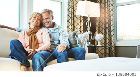 Relax, home and portrait of mature couple on sofa for bonding, healthy relationship and marriage. Retirement, home and senior man and woman on couch for love, commitment and embrace in living room 138684003
