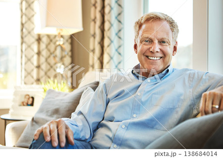 Portrait, senior or happy man in living room on couch or sofa to relax with freedom at home for resting break. Laughing, face or mature person with smile or wellness in retirement, lounge or house Portrait, senior or happy man in living room on couch or sofa to relax with freedom at home for resting break. Laughing, face or mature person with smile or wellness in retirement, lounge or house 138684014