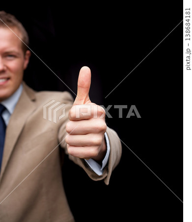 Closeup, thumbs up and smile for business man, hand or agreement in portrait by black background. Entrepreneur, happy or sign language for support, thanks or icon for vote, choice or decision on deal 138684181