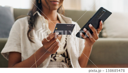 Woman, hands and phone with credit card for online shopping, payment or transaction in living room at home. Closeup of female person or shopper on mobile smartphone with debit for ecommerce at house Woman, hands and phone with credit card for online shopping, payment or transaction in living room at home. Closeup of female person or shopper on mobile smartphone with debit for ecommerce at house 138685478