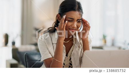 Laptop, headache or stress and a student woman in the living room of her home with study problems. Computer, anxiety or education and a young person having trouble with university or college exams 138685732