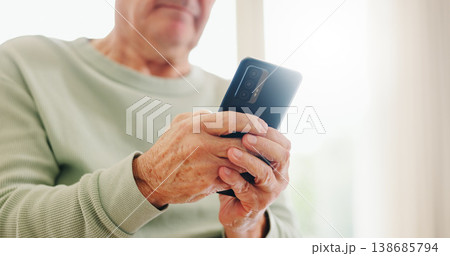 Home, closeup and senior hands with a cellphone, typing and connection with social media, digital app and contact. Old man, pensioner or mature guy with a smartphone, mobile user and search internet Home, closeup and senior hands with a cellphone, typing and connection with social media, digital app and contact. Old man, pensioner or mature guy with a smartphone, mobile user and search internet 138685794