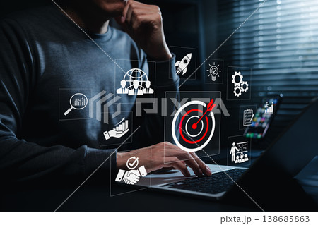 Business Target and Strategic Growth Concept. Businessman using laptop with target, analytics, teamwork, partnership, planning, strategy, goal achievement, market expansion, performance improvement 138685863