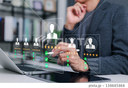 Candidate Assessment and Talent Selection. HR professional reviewing candidate profiles with ratings and check marks. talent evaluation, hiring decisions, applicant comparison, recruitment quality, Candidate Assessment and Talent Selection. HR professional reviewing candidate profiles with ratings and check marks. talent evaluation, hiring decisions, applicant comparison, recruitment quality, 138685868