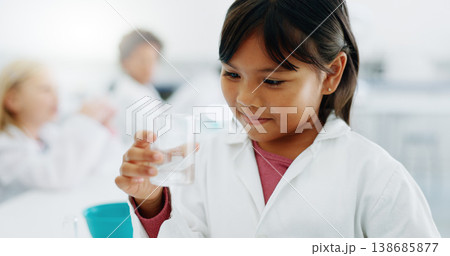 Experiment, science and girl with chemical and classroom or lab project with learning and education. Smile, children and school work with study, chemistry and child student with research knowledge 138685877