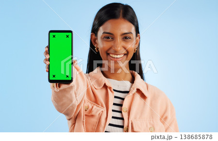 Smartphone green screen, happy portrait and woman show web communication, mobile search engine or app chroma key. Tracking markers, cellphone mockup space and studio tech person on blue background Smartphone green screen, happy portrait and woman show web communication, mobile search engine or app chroma key. Tracking markers, cellphone mockup space and studio tech person on blue background 138685878