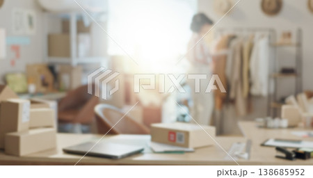 Retail office, ecommerce and a person with a desk for logistics, stock or small business. Fashion, industry and a designer with a table for cargo, package or a supplier of clothes at a workshop Retail office, ecommerce and a person with a desk for logistics, stock or small business. Fashion, industry and a designer with a table for cargo, package or a supplier of clothes at a workshop 138685952