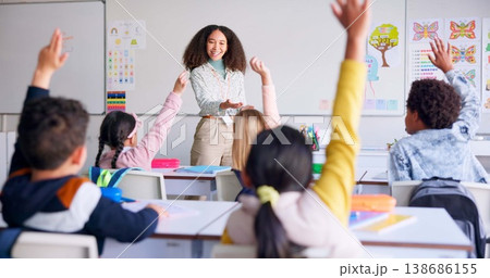 School, raised hand and woman teacher in classroom with kids for learning, discussion and knowledge. Help, studying and children students with questions for female educator or tutor for education. School, raised hand and woman teacher in classroom with kids for learning, discussion and knowledge. Help, studying and children students with questions for female educator or tutor for education. 138686155