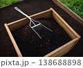 Garden Fork Tool in Raised Wooden Bed 138688898