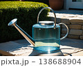 Vintage Style Metal Watering Can in Garden 138688904