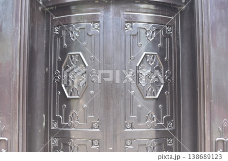 Fragment of antique Iron steel door England, Central Hong Kong. Old city background, retro style.  138689123