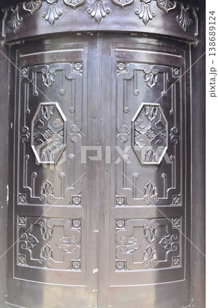 Fragment of antique Iron steel door England, Central Hong Kong. Old city background, retro style. Fragment of antique Iron steel door England, Central Hong Kong. Old city background, retro style. 138689124