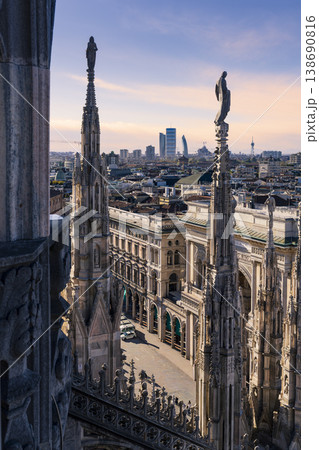 Statues of Duomo of Milan and Duomo square background Milan's financial district 138690816