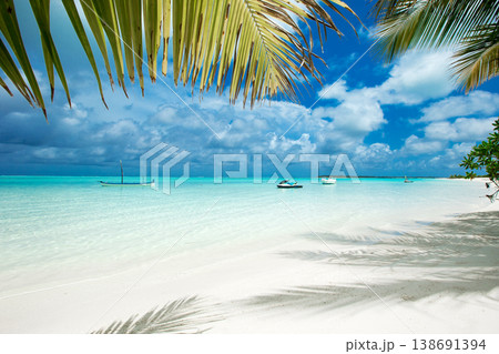 Sea beach. Tropical Maldives island with white sandy beach and sea. 138691394