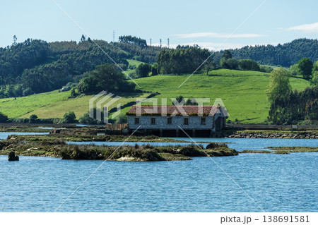 Marismas de Escalante wetlands with old tide mill Marismas de Escalante wetlands with old tide mill 138691581