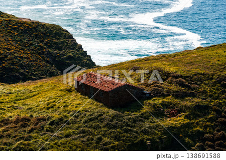 Picturesque coastal cottage on Cape Quejo, Cantabria, Spain, with ocean views. Picturesque coastal cottage on Cape Quejo, Cantabria, Spain, with ocean views. 138691588