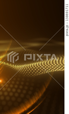 Golden particle dots forming smooth flowing waves and ripples, creating a warm luxury abstract technology background with soft bokeh glow 138691711