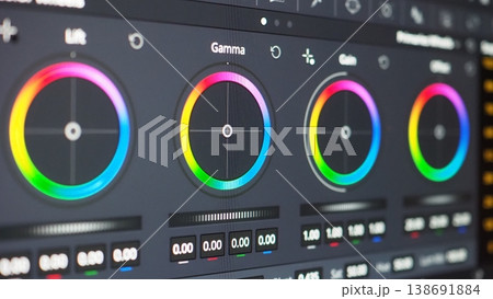 Color grading control panel. Close up of professional video color grading tools on a monitor. RGB waveform scopes hue controls color wheels adjustments. Editing post production and filmmaking concepts 138691884