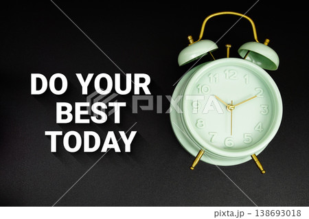 Do Your Best Today text with alarm clock on black background 138693018